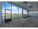 Relaxing screened lanai with views of the lake, offering a seamless indoor-outdoor living experience at 6263 W Fallsgrove Ln, Port Orange, FL 32128