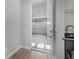 Mudroom with garage access through a sturdy door and a sleek stainless-steel utility sink at 6263 W Fallsgrove Ln, Port Orange, FL 32128