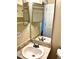 Bathroom features a single sink and large mirror at 662 Comstock Dr, Deltona, FL 32738