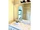 Bathroom featuring a sink with a large mirror and a shower at 662 Comstock Dr, Deltona, FL 32738