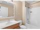 Bathroom featuring a shower/tub combo and a vanity sink at 707 Leeward Dr, Deltona, FL 32738