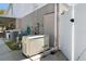 View of the exterior, which includes a generator and access to the covered back porch at 707 Leeward Dr, Deltona, FL 32738