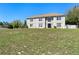 Charming two-story home with a large front yard and ample natural light at 707 Leeward Dr, Deltona, FL 32738