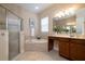 Luxurious bathroom with a soaking tub, glass shower, and vanity area at 903 Victoria Hills S Dr, Deland, FL 32724