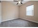 Bedroom featuring neutral tones, plush carpet, and ample natural light at 903 Victoria Hills S Dr, Deland, FL 32724