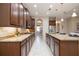 Spacious kitchen with granite counters, tile backsplash, and stainless steel appliances at 903 Victoria Hills S Dr, Deland, FL 32724