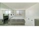 Bright bedroom with large window and tile flooring at 925 N Halifax Ave # 910, Daytona Beach, FL 32118