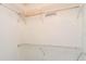 Walk-in closet featuring wired shelving at 925 N Halifax Ave # 910, Daytona Beach, FL 32118