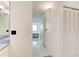 Hallway view with a closet and bathroom at 925 N Halifax Ave # 910, Daytona Beach, FL 32118