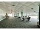 Spacious meeting room features flexible seating arrangements and scenic views of the surrounding landscape at 925 N Halifax Ave # 910, Daytona Beach, FL 32118