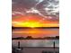 Stunning waterfront view from the pool at sunset, creating a serene and luxurious ambiance at 925 N Halifax Ave # 910, Daytona Beach, FL 32118