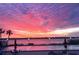 Enjoy breathtaking sunset views from the pool, surrounded by lush landscaping and peaceful waters at 925 N Halifax Ave # 910, Daytona Beach, FL 32118