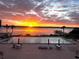 Enjoy breathtaking sunset views from the pool, surrounded by lush landscaping and peaceful waters at 925 N Halifax Ave # 910, Daytona Beach, FL 32118