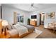 Bright main bedroom with sliding door, walk-in closet, and comfortable neutral decor at 951 Lovington Dr, Deltona, FL 32738