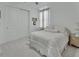 Cozy bedroom with a plush bed, soft lighting, and neutral decor at 1079 Lincolnshire Dr, Deland, FL 32724