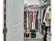 Organized walk-in closet with shelving, hanging rods, and various storage solutions at 1079 Lincolnshire Dr, Deland, FL 32724