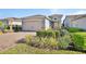 Attractive single-Gathering home boasting a brick driveway and meticulously maintained front yard at 1079 Lincolnshire Dr, Deland, FL 32724