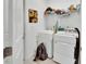 Laundry room with modern washer and dryer, storage shelves, and convenient accessories at 1079 Lincolnshire Dr, Deland, FL 32724