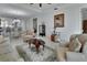 Bright living area with tile floors and seamless access to the dining and kitchen spaces at 1079 Lincolnshire Dr, Deland, FL 32724