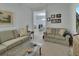 Inviting living room with neutral color palette at 1079 Lincolnshire Dr, Deland, FL 32724