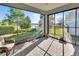 Relaxing screened-in patio with a view of the lake, perfect for outdoor enjoyment at 1079 Lincolnshire Dr, Deland, FL 32724