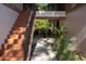 Exterior condo staircase, providing access to upper-level units at 100 Sweetgum Woods Ct # 10C, Deltona, FL 32725