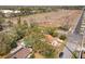 Aerial view of the property featuring a pool, fenced backyard, and surrounding neighborhood at 1002 Charles St, Port Orange, FL 32129