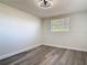 Bright bedroom with sleek flooring and one window at 1002 Charles St, Port Orange, FL 32129