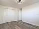 Bright bedroom with sleek flooring and double door closet at 1002 Charles St, Port Orange, FL 32129