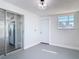 Bonus room with a door and sliding glass door providing access to outside at 1002 Charles St, Port Orange, FL 32129