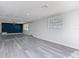 Spacious living room featuring wood-look floors and abundant natural light at 1002 Charles St, Port Orange, FL 32129