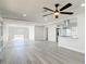 Large living room offers an open floor plan with views to a modern kitchen at 1002 Charles St, Port Orange, FL 32129
