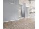 Spacious living area with modern gray walls and wood-look flooring at 102 Underbrush Trl, Port Orange, FL 32128