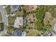 Aerial view of the property and neighborhood with large back yard at 1058 W Seagate Dr, Deltona, FL 32725