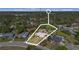 Expansive home with lush greenery, nestled within a serene neighborhood and mature trees at 1058 W Seagate Dr, Deltona, FL 32725