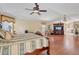 A large bedroom features hardwood floors and an entertainment center visible from the bed at 1058 W Seagate Dr, Deltona, FL 32725