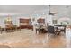 Open-concept living space with hardwood floors and a smooth flow into the kitchen and dining areas at 1058 W Seagate Dr, Deltona, FL 32725
