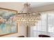 Close up of chandelier in dining room at 1062 Golf View Estates Dr, Orange City, FL 32763
