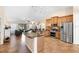 Open concept kitchen with stainless steel appliances, granite counters, and tile flooring at 1062 Golf View Estates Dr, Orange City, FL 32763