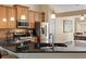 Kitchen with granite countertops, stainless appliances, breakfast bar and dining room views at 1062 Golf View Estates Dr, Orange City, FL 32763