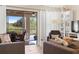 Bright living room showcases the outside views from the sliding glass doors at 1062 Golf View Estates Dr, Orange City, FL 32763