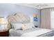Stylish main bedroom is complete with a ceiling fan and accent lamps at 1062 Golf View Estates Dr, Orange City, FL 32763
