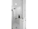 Bright frameless shower with handheld shower and built in shelving at 1062 Golf View Estates Dr, Orange City, FL 32763