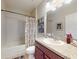 Well-maintained bathroom with a shower-tub combination and a vanity with ample counter space at 107 Gladesdown Ct, Deland, FL 32724