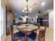 Open dining area with adjacent kitchen and living spaces, perfect for modern living at 107 Gladesdown Ct, Deland, FL 32724