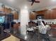 Beautiful kitchen with dark cabinets, granite countertops, and stainless steel appliances at 107 Gladesdown Ct, Deland, FL 32724