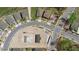 Aerial view of a home construction site within a residential community, with surrounding houses and streets at 1088 Happy Forest Loop, Deland, FL 32720