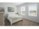 Serene bedroom with neutral decor, bright light and a calming atmosphere at 1088 Happy Forest Loop, Deland, FL 32720