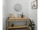 Neutral entryway featuring a console table with decorative accents and a mirror at 1088 Happy Forest Loop, Deland, FL 32720