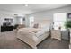 Spacious main bedroom with ample natural light and a sitting area at 1088 Happy Forest Loop, Deland, FL 32720